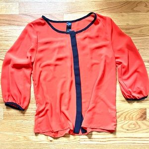 Orange and blue button up three quarter sleeve top